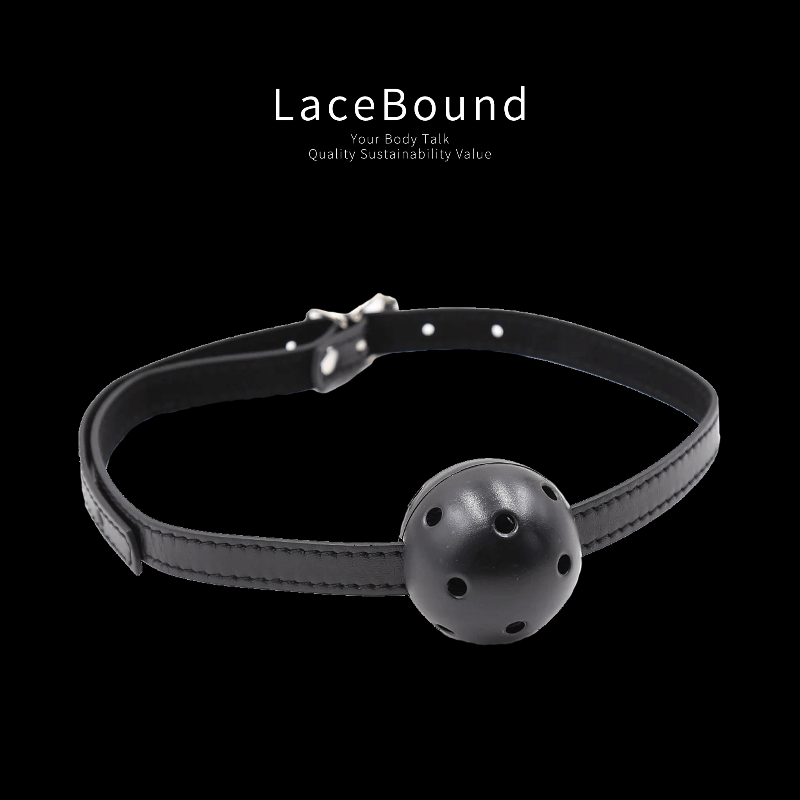 Black adjustable ball gag harness for BDSM play, featuring a smooth silicone ball and secure head straps, designed for comfortable restraint and erotic power dynamics.