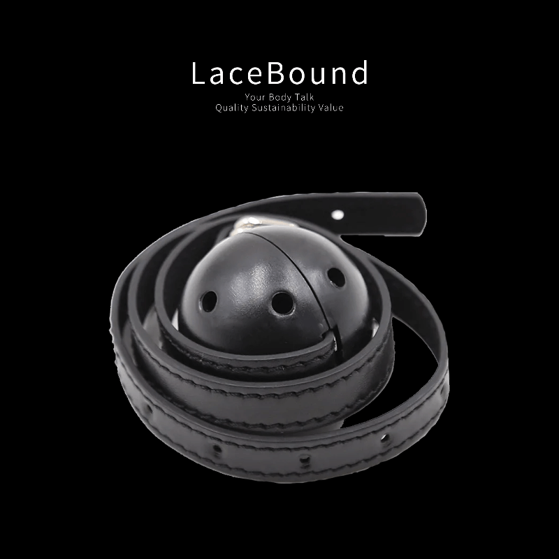 Black adjustable ball gag harness for BDSM, featuring a round black gag and adjustable straps for secure and comfortable fit, perfect for restraint and submissive role play.