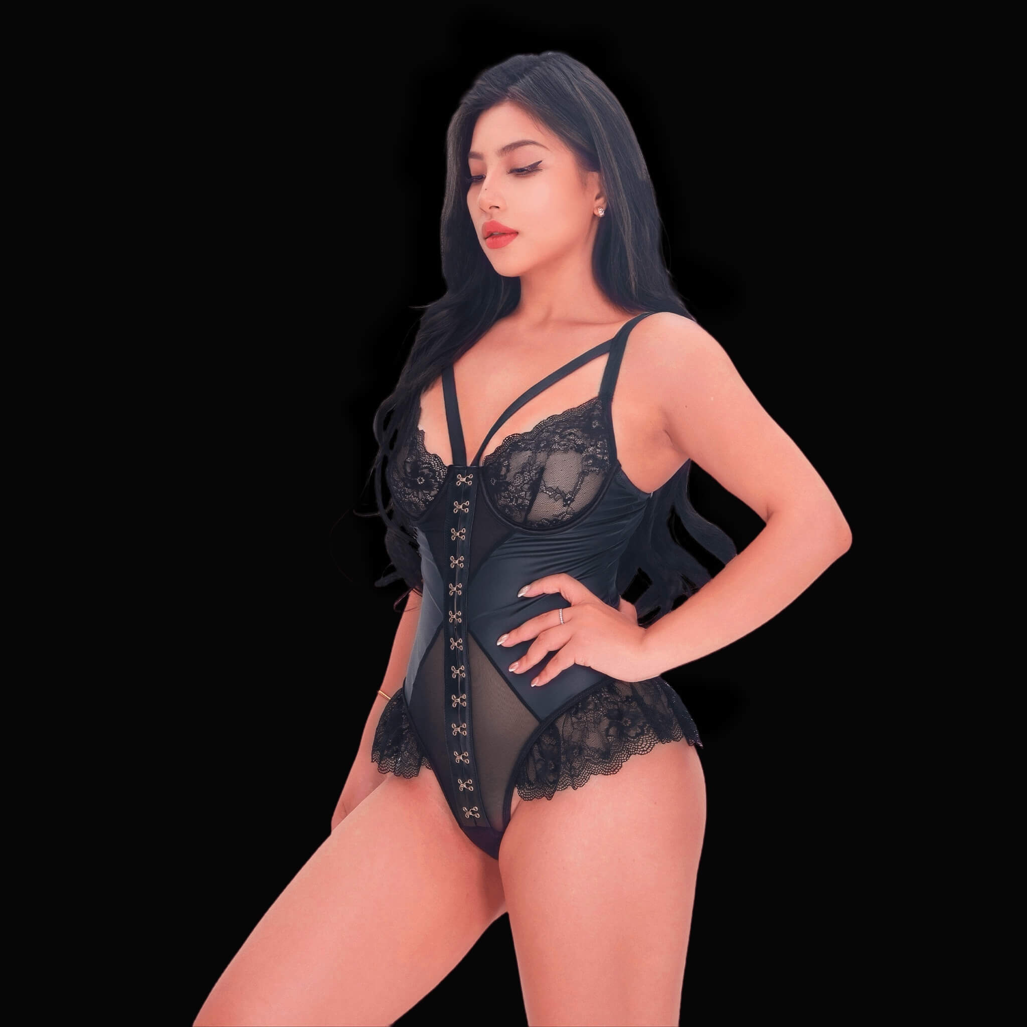 Corset-inspired black lace bodysuit with plunging neckline, underwired cups, and adjustable straps, featuring sheer panels and a sculpted silhouette.