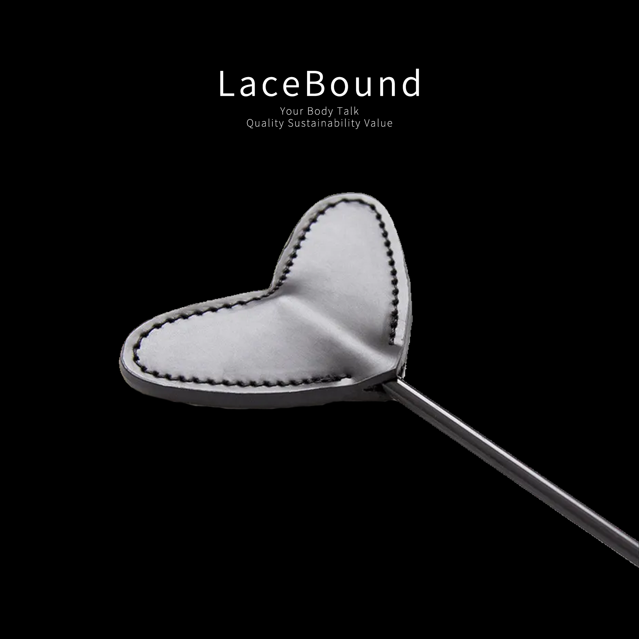 Heart-shaped BDSM whip designed for playful spanking and sensual impact play, featuring a soft faux leather heart tip and durable handle, ideal for flirty and intimate BDSM experiences.