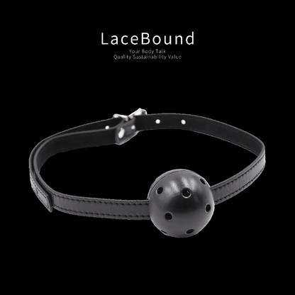 Black adjustable ball gag harness for BDSM play, featuring a smooth silicone ball and secure head straps, designed for comfortable restraint and erotic power dynamics.