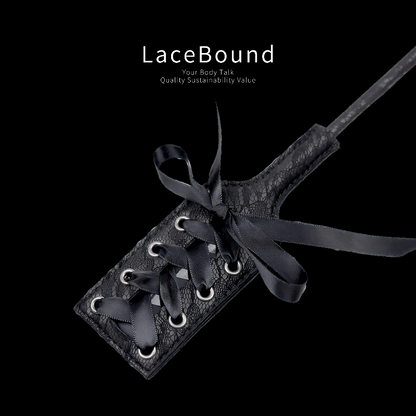 Black feather tickler and leather paddle set for BDSM sensual play, featuring elegant black feathers for teasing and a durable leather paddle for responsive impact, designed for erotic sensory experience.