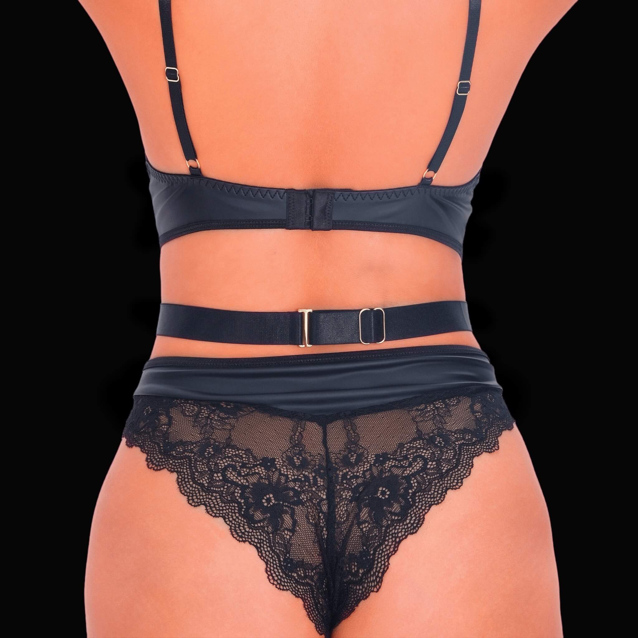 Black lace bodysuit with sexy floral details, adorned with intricate lacework and floral patterns for a chic, enchanting, and romantic lingerie look.