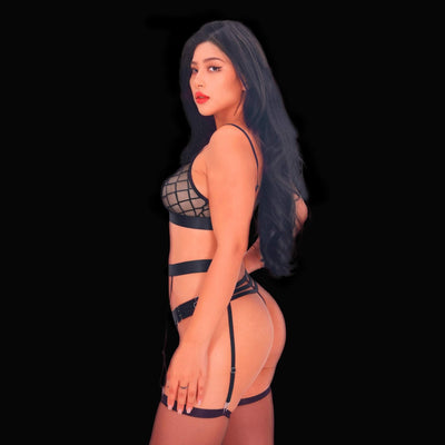 Black sexy lingerie set with sheer see-through mesh, elegant bra with adjustable straps, and matching panties, designed for a seductive and sophisticated silhouette.