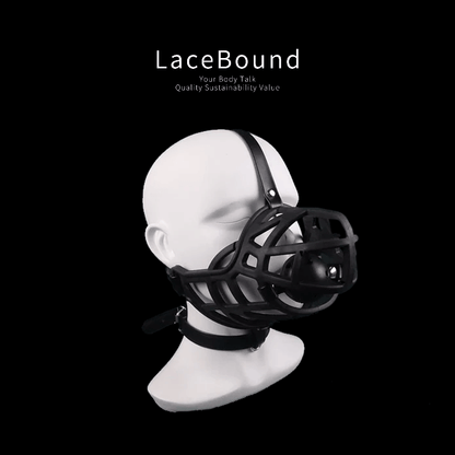 Dog muzzle BDSM mask with ball gag and adjustable straps, crafted from durable faux leather for secure fit and intense pet play or bondage roleplay experiences.