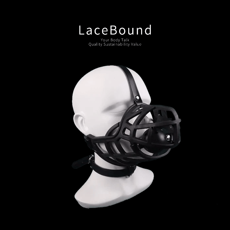 Dog muzzle BDSM mask with ball gag and adjustable straps, crafted from durable faux leather for secure fit and intense pet play or bondage roleplay experiences.