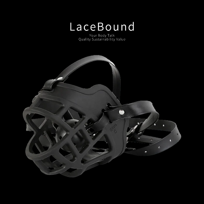 Dog muzzle BDSM mask with ball gag and adjustable straps, constructed from high-quality faux leather for a secure, comfortable fit, perfect for intense pet play and bondage roleplay