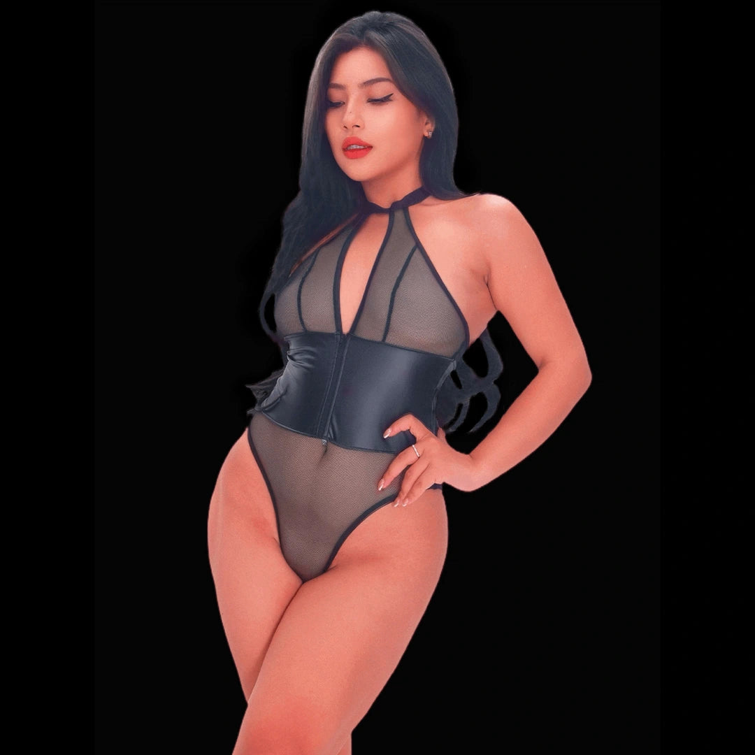 Nude faux leather and fishnet cage lingerie set featuring strappy cutouts, sheer mesh panels, and a seductive boudoir‑style design that emphasizes curves and sensuality.