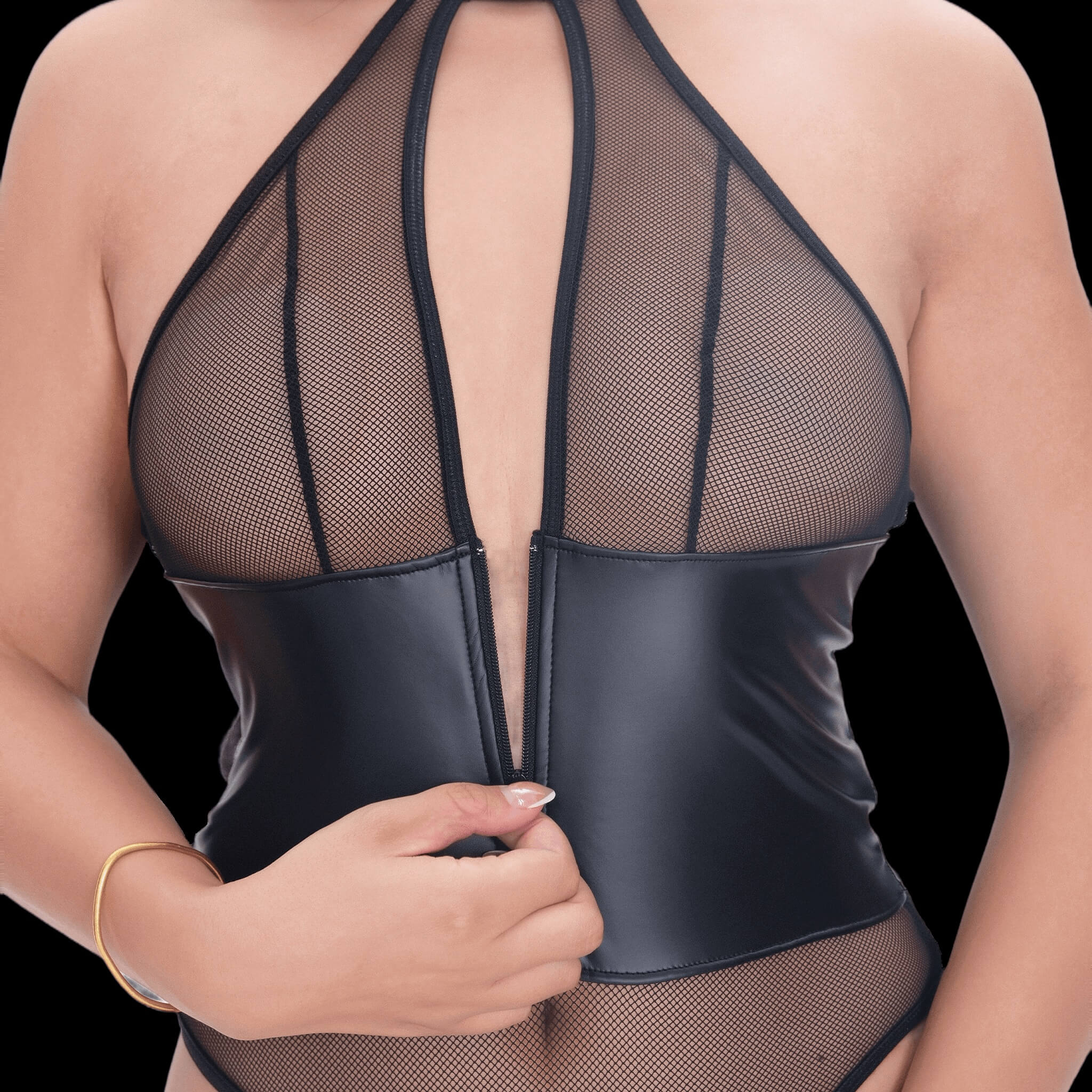 Faux leather and fishnet cage lingerie set in nude tones, featuring bold strappy details and sheer fishnet panels for a sultry, modern, and provocative look.