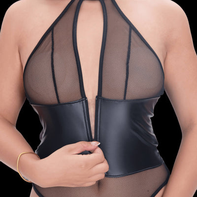 Faux leather and fishnet cage lingerie set in nude tones, featuring bold strappy details and sheer fishnet panels for a sultry, modern, and provocative look.