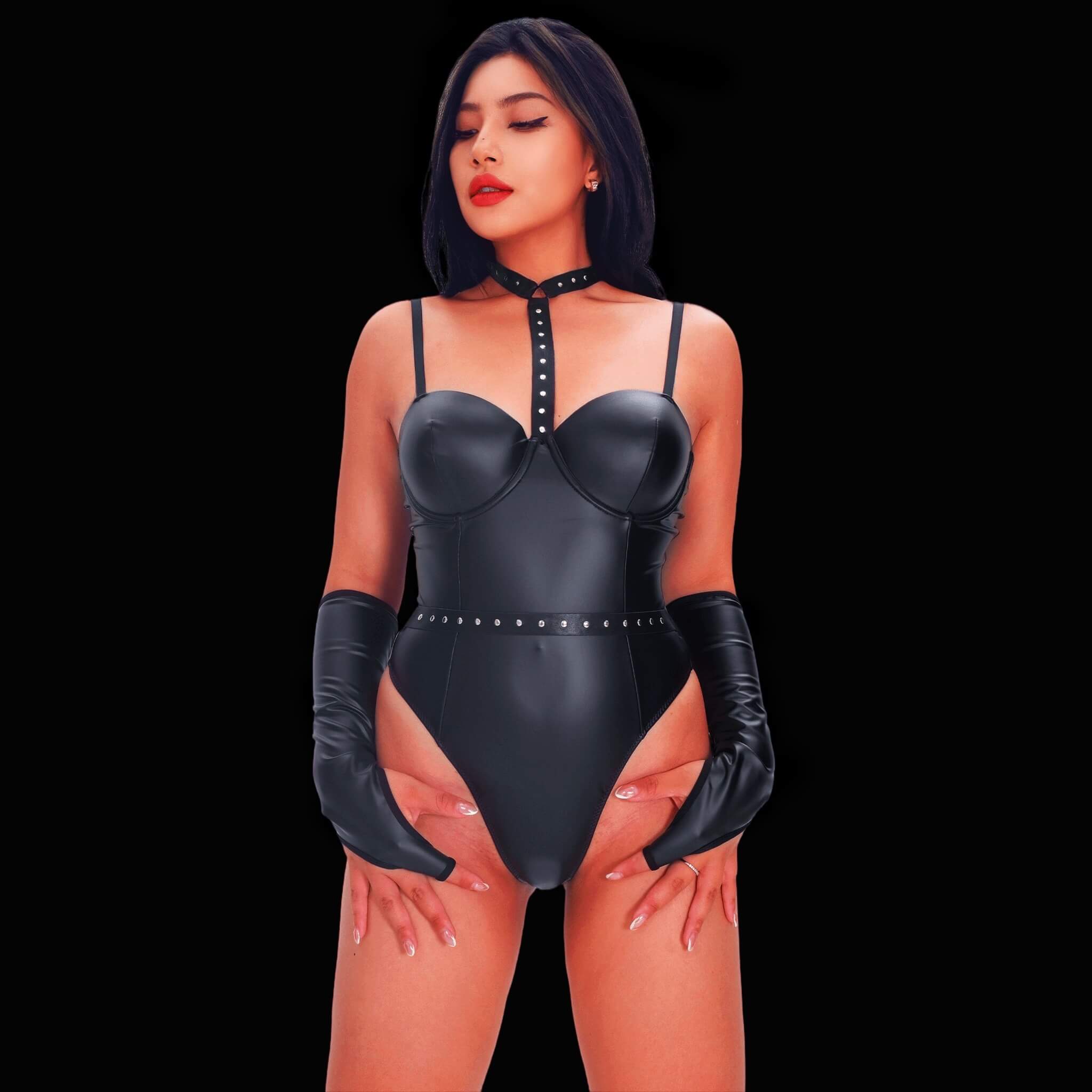 Black leather corset bodysuit with sleeves, featuring a sculpted, fitted design and stylish sleeve accents for an eye-catching, daring, and elegant fashion statement.