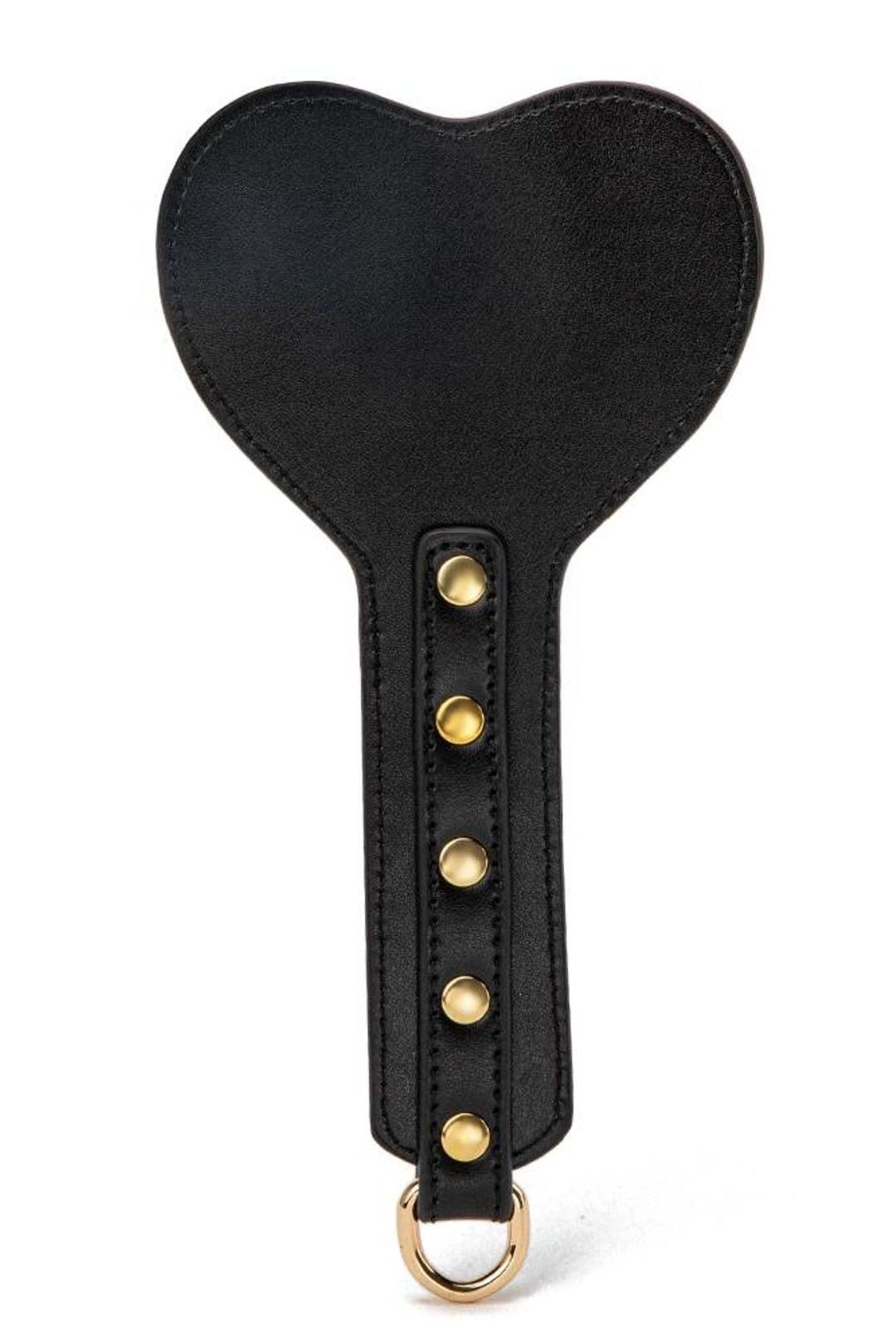 Luxury BDSM all-in-one restraint kit featuring premium leather cuffs, collar, blindfold, and whip, crafted for secure, versatile, and elegant bondage experiences.