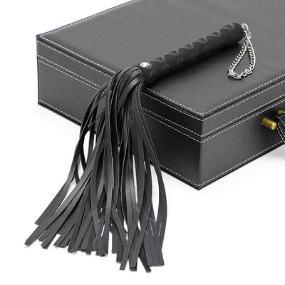 Luxury BDSM all-in-one bondage kit featuring premium leather restraints, collar, blindfold, and whip, designed for secure, versatile, and elegant fetish play.