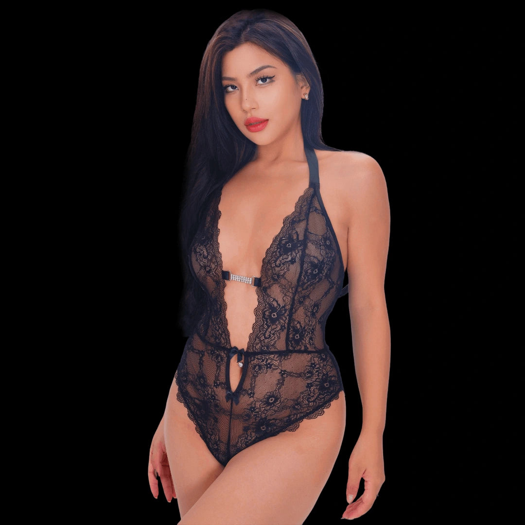 Sexy black lace bodysuit with a deep V neckline, sheer lace, and elegant floral detailing for a sophisticated, alluring, and feminine lingerie look.