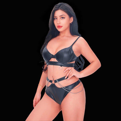 Sexy black leather corset with chain bondage style, featuring prominent chain embellishments and sleek harness elements for a fierce, sensational, and rebellious lingerie look.