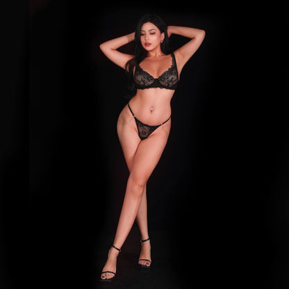 Sexy black lace bra and panty set featuring sheer see-through lace and elegant floral designs, crafted for a seductive, graceful, and feminine lingerie look.