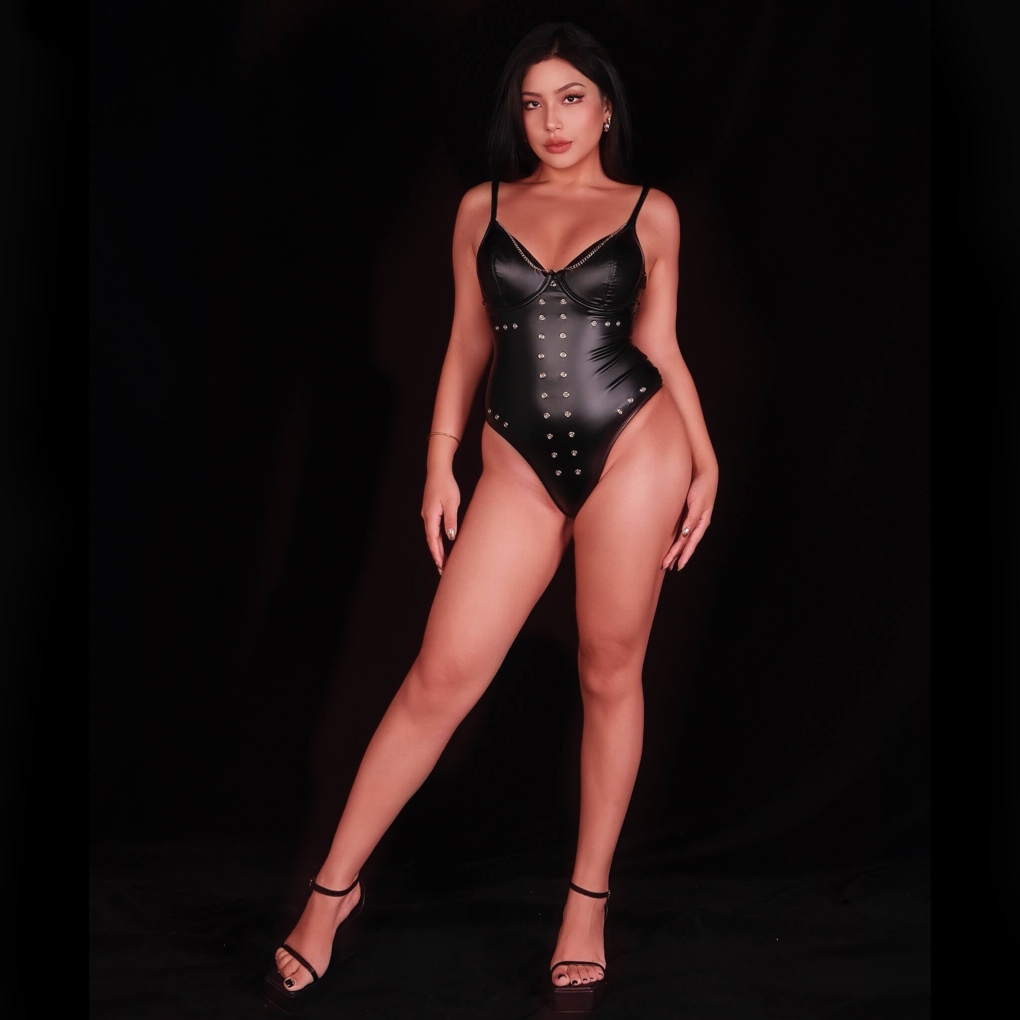 Sexy lingerie corset bodysuit with bold elegance, designed with a striking structured corset and refined accents for a distinctive, glamorous, and empowered lingerie style.